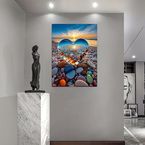 Coucher de soleil sur la plage en tableau cœur de galets pour salon