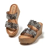 STILE CIABATTE MODA: Queste ciabatte moda donna zeppa uniscono eleganza e tendenza grazie ai raffinati decori floreali con strass, ideali per chi cerca un look ricercato e luminoso.