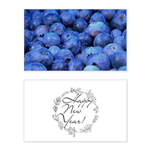 Tarjeta conmemorativa de Año Nuevo de frutas tropicales y arándanos frescos para fiestas