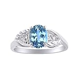 Juego de anillos de diamante y topacio azul en oro blanco de 14 quilates con diseño de alas de diamante