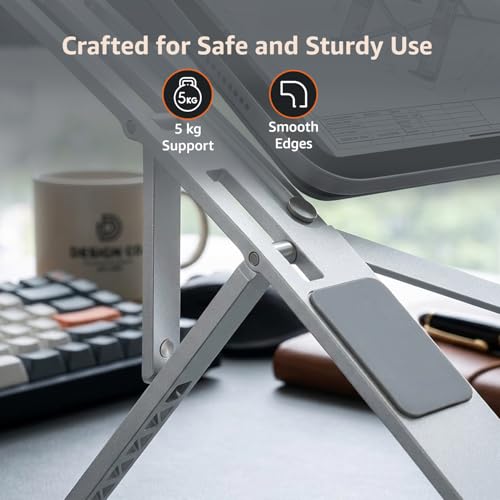 Image of amazon basics Laptop Stand, Height-Adjustable, Foldable, Portable, Ventilated, Fits Up to 15.6-Inch Laptops (Aluminium Alloy, Silver)
