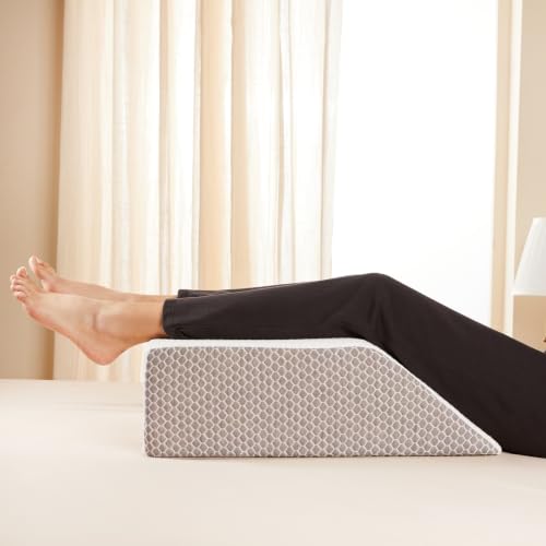 Image of amazon basics Wedge Leg Pillow | High Resilience Super-Soft Foam | Leg, Hip, Thigh & Knee Rest | Generous Size for Both Legs | Washable Cover | 22 x 20 x 7 in | White & Grey