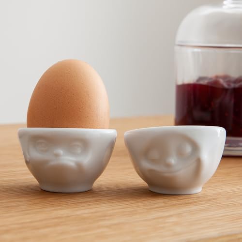 Foto von FIFTYEIGHT PRODUCTS / Tassen/Eierbecher - Set Nr. 3 „Glücklich & HMPFF“ (Porzellan, weiß, Made in Germany)