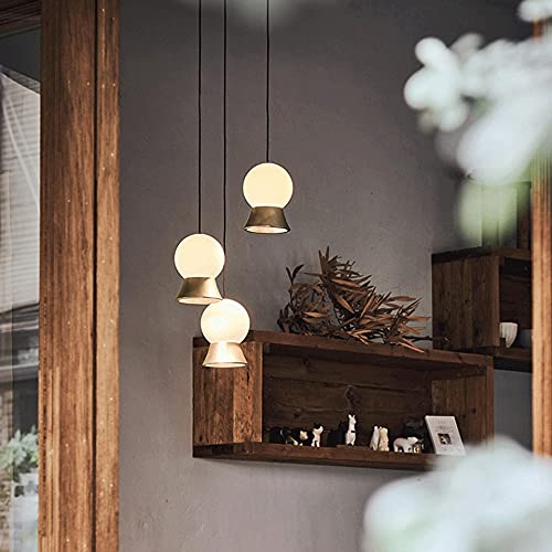 Lámpara colgante de globo para iluminar tu mesa de comedor con calidez 3