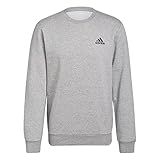 sudadera adidas negra con rayas rojas Puños acanalados y dobladillo