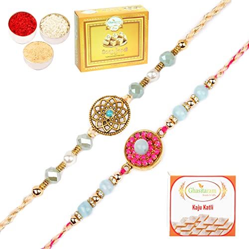 Ghasitaram Gifts Rakhi for Brother Rakhis Online – Set of 2 Rm- 643 and Rm- 654 Premium Rakhis with 200 gms of Kaju katli and 200 gms of Soan Papdi Ghasitaram Gifts Rakhi for Brother Rakhis Online – Set of 2 Rm- 643 and Rm- 654 Premium Rakhis with 200 gms of Kaju katli and 200 gms of Soan Papdi