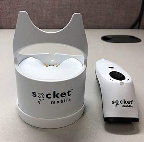 SocketScan S700 scanner next to its white charging dock