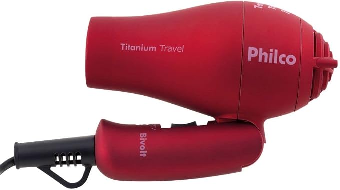 Secador de cabelos Philco Titanium Travel vermelho visto de lado com o cabo dobrado