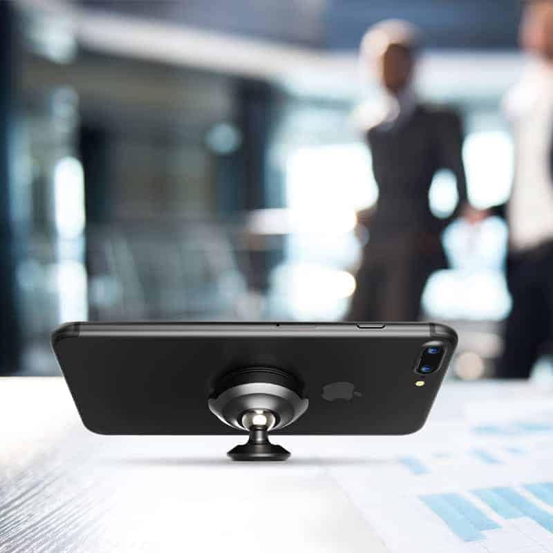 Baseus magnetic holder with a smartphone on a desk
