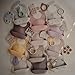mushie Silicone Baby Bib | Adjustable Fit Waterproof Bibs (Blush)