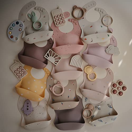Image of mushie Silicone Baby Bib | Adjustable Fit Waterproof Bibs (Dusty Rose)