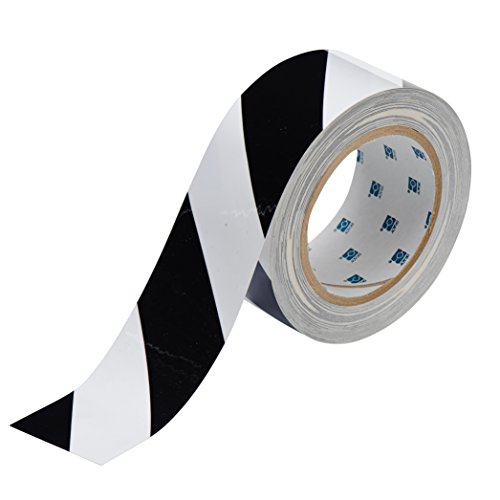 Image of Brady ToughStripe Nonabrasive Diagonal Stripes Floor Marking Tape, 100' Length, 2 inch Width, Black on White (Pack of 1 Roll) - 104319 | Nonabrasive black-and-white diagonal tape measures 2 in x 100 ft for marking aisles, hazards, equipment, and boundaries.