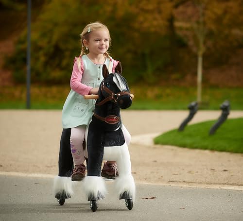 Ponnie Reitpferd mit Rollen Domino S (3-6 Jahre), Spielpferd zum Reiten mit Abnehmbarer Rosa Sattel und Halfter mit Zaumzeugund Kämmbare Mähne und Schwanz, Plüschpferd zum Reiten für Kinder