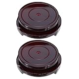 Accessoire de décoration raffiné : avec ses élégantes teintes brunes et son grain unique, ce pied de vase en bois sert également de socle décoratif rond et met en valeur tout décor moderne ou champêtre