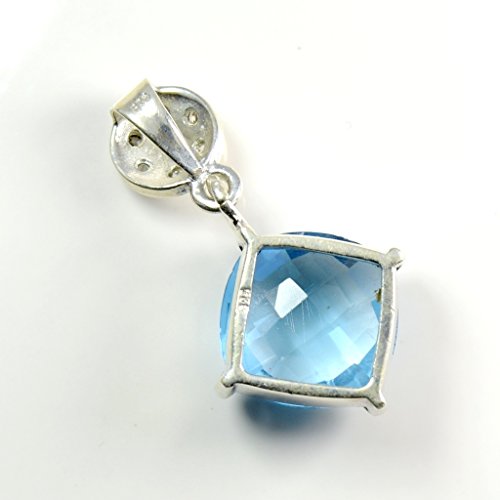 Pendentif topaze bleue naturelle taillée main sur monture argent 4 griffes