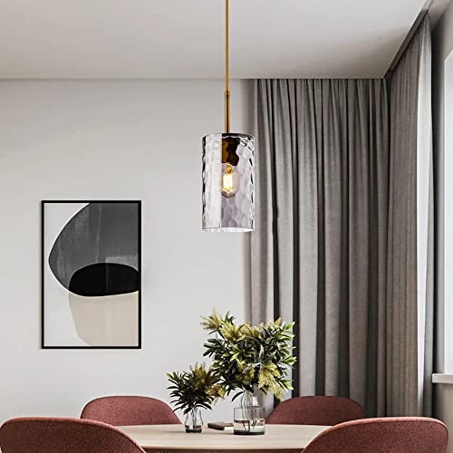Lámpara colgante ajustable sobre la mesa de comedor con cristal gris 3