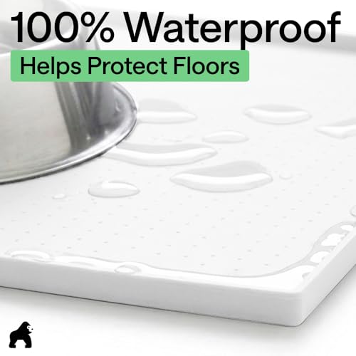 Image of GORILLA GRIP 100% Waterproof Raised Edge BPA Free Silicone Pet Feeding Mat, Dog Cat Food Mats Contain Spills Protects Floors, Placemats for Cats and Dogs Water Bowl, Pets Accessories 23x15 White
