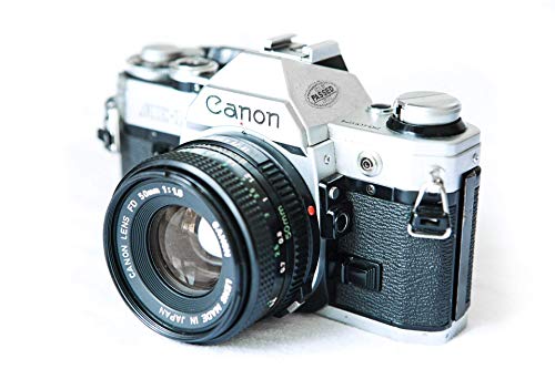 Vintage Canon AE-1 35mm SLR Camera with 50mm 1:1.8 Lens