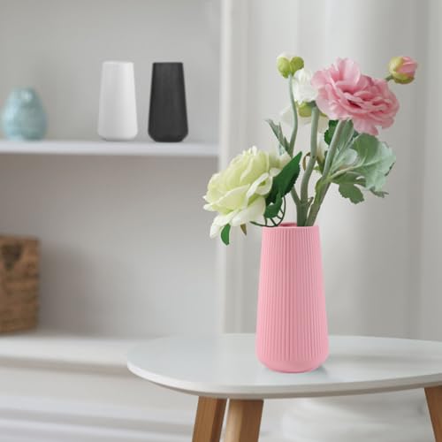 Vase en céramique rose compact pour sublimer les petits espaces et étagères