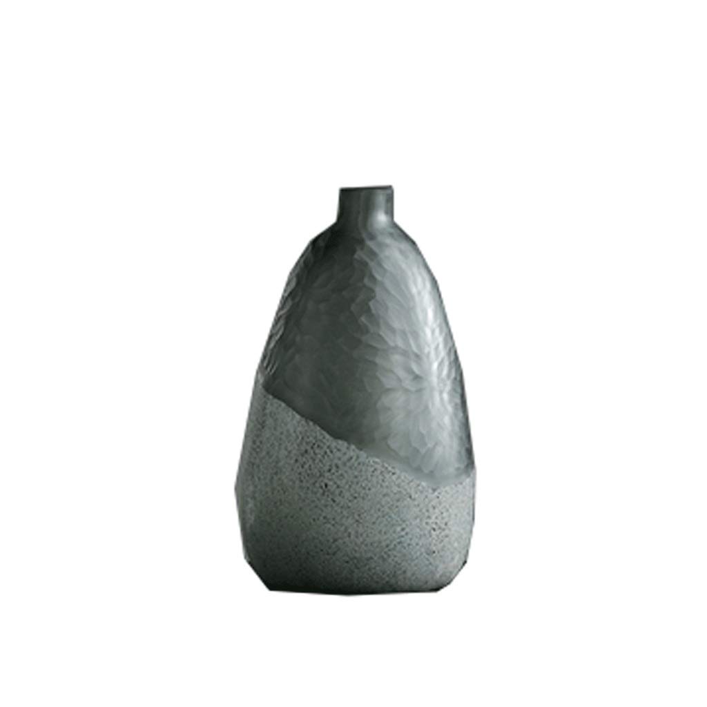 Vase en verre soufflé de style moderne pour valoriser une simple fleur dans la chambre
