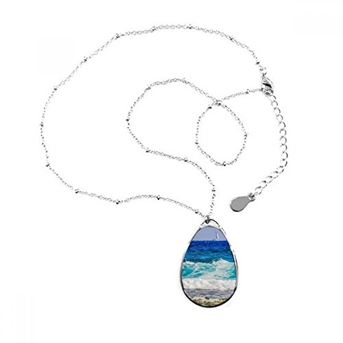 Pendentif en forme de goutte d'eau motif mer à porter pour vos sorties estivales