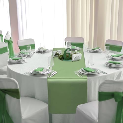 Image of 12Pack 12x108 Inch Satin Table Runner and 84 Inch Round Plastic Tablecloths White Sage Green Disposable Round Table Cover for Graduation Wedding Bridal Shower Anniversary Birthday Party Decorations