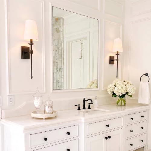 Image of Kira Home Torche 20 inch Mid Century Modern Wall Sconce for Bathroom Vanity | Tapered White Linen Shade, Candle Wall Light with Elongated Tail, Oil Rubbed Bronze Finish