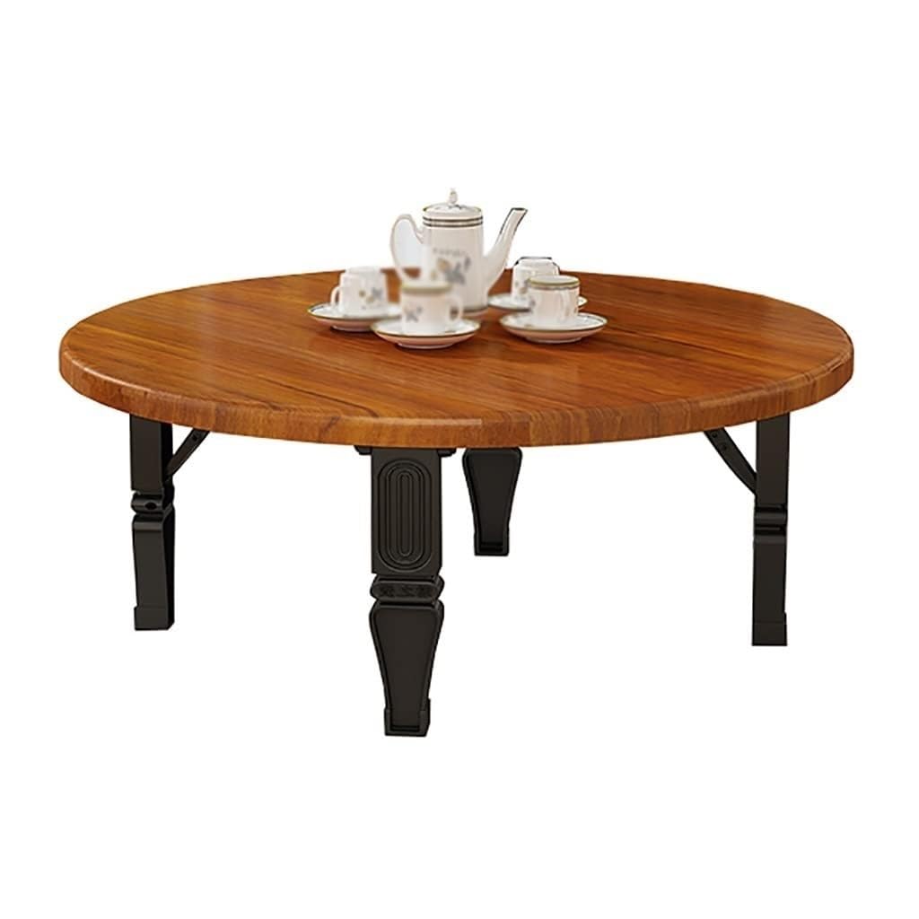 Table basse pliante gain de place, modèle rond pour petit salon