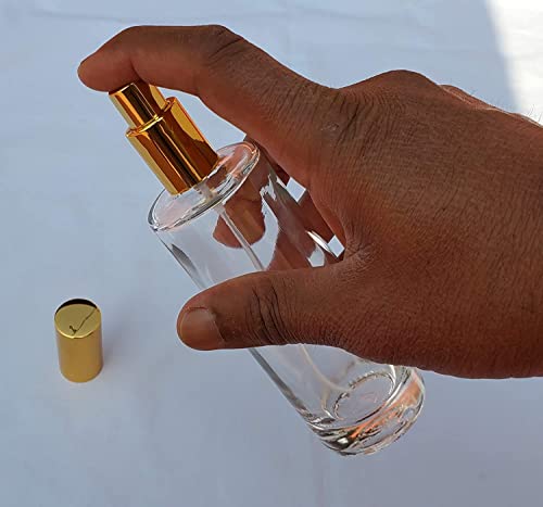 Image of Pure Source India 100ML Clear Glass Perfume Spray Bottle with Gold Atomizer Pump & Cap - Refillable & Reusable Fine Mist Sprayer (Set of 4)
