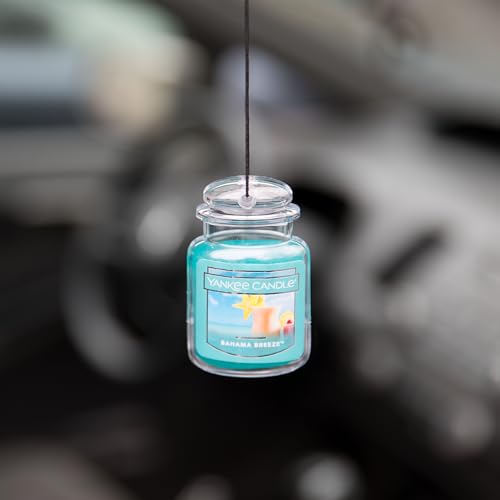 Image of Yankee Candle Car Jar Ultimate Air Freshener, Hanging Car Freshener, Long Lasting Car Fragrance, Bahama Breeze (Pack of 1)