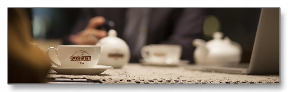 BASILUR Winter Holidays - Czarna liściasta herbata z dodatkiem wiśni, skórki i kwiatów pomarańczy, świąteczna herbata 85 g, 1 paczka