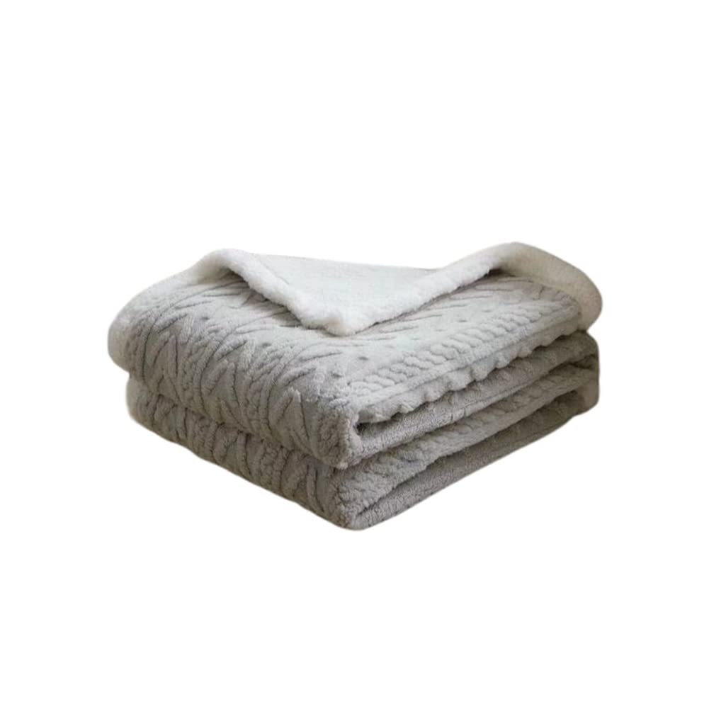 Couverture chaude hiver pour des soirées cocooning confortables sur le canapé