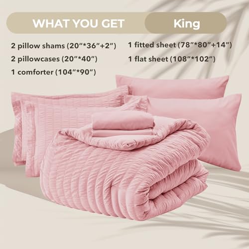 Image of HYMOKEGE Pink King Size Comforter Set Seersucker 7 Pieces, All Season Luxury Bed in a Bag for Bedroom, Bedding Set with Comforters, Sheets, Pillowcases & Shams