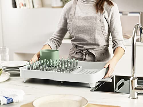 Image of Joseph Joseph Extend Expandable Dish Drainer Rack with Removable Flatware Holder Swivel Draining Spout - Stone /Sage Green