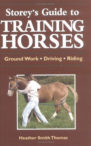 Storey's Guide to Training Horses (Storey’s Gui... 158017468X Book Cover