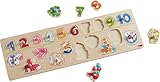 Mit diesem liebevoll gestalteten Holzspielzeug können kleine Puzzle-Experten ihr Können zeigen und lernen ganz nebenbei das Zählen