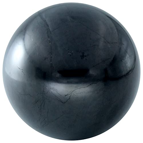 Sphère en shungite polie dans votre salon pour harmoniser le cristal d'énergie de guérison