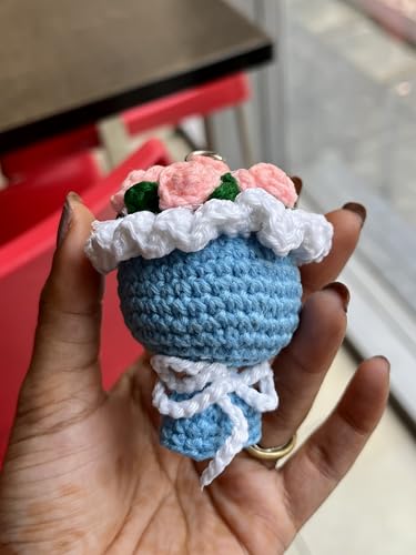 Image of Handmade Crochet Floral Bouquet Keychain, Blue Base with Pink Roses, White Cloud Detail, Decorative Bag Charm