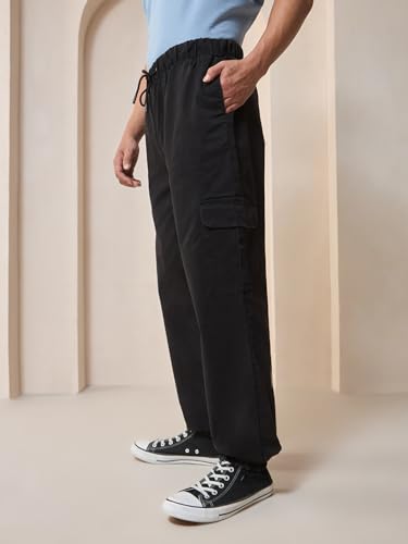 Image of Bewakoof Men's 100% Cotton Oversized Fit Joggers | Track pants for man | Lower for man | Trouser for men | Baggy trackpants for men | Multipurpose | Mens Lower Activewear | Utility Pockets | Lightweight & Flexible Elastic Waist | Casual Joggers | Loose Fit