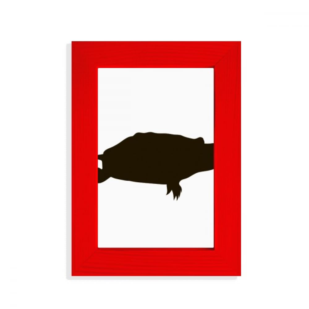 Cadre photo tortue noire idéal sur un buffet de salon cosy