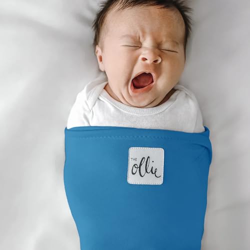 Image of The Ollie Swaddle - Adjustable Baby Swaddle for Newborns | Pediatrician-Approved for Safe Sleep | Easy Closure | Arms-Out | Lightweight, Machine-Washable | Easy Diaper Access (Ocean, One Size)