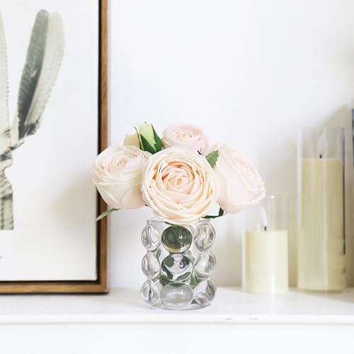 Fleurs artificielles dans un vase roses maison et mariage