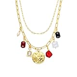 Matériau : alliage métallique. Finition : or 18 carats. Pierre : corail. Dimensions du pendentif : 32 mm de long x 28 mm de large. Longueur du collier : 45 cm. Fermeture : mousqueton.