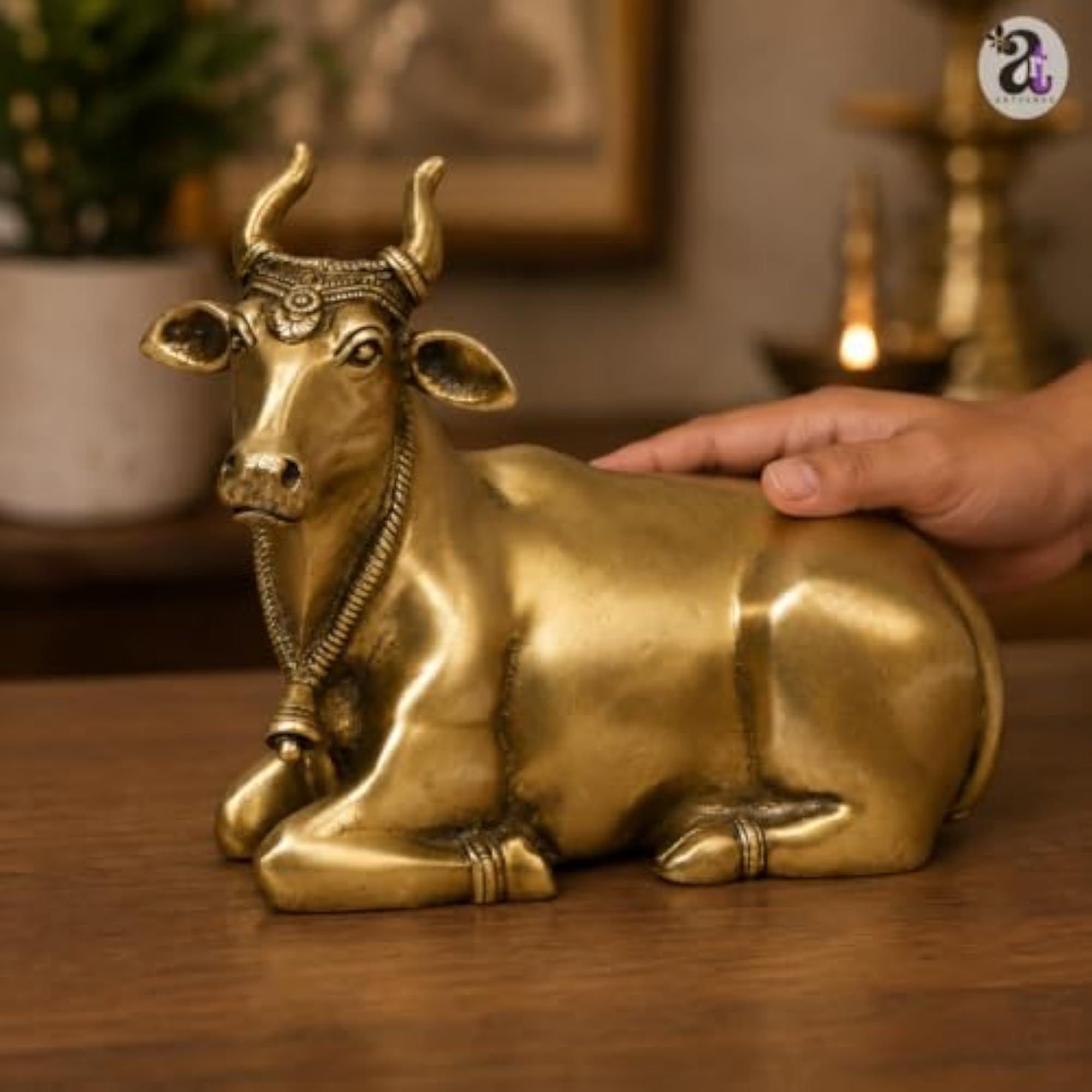 Brass Sitting Nandi Cow Statue, Home Decoration
