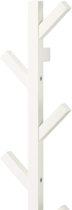 IKEA TJUSIG Věšák namontovaný na bílé zdi, viewz mírného úhlu.