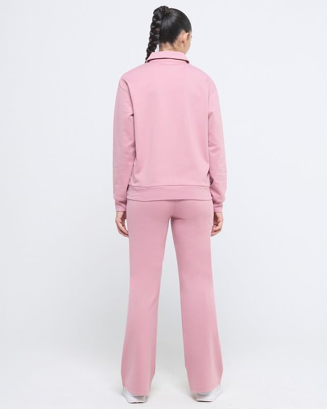 Image of HUNNIT Essential Flare Pants for Women with Zip Pockets | Mid Waist Solid Cotton Tapered Flare Pants | Bootcut Flared Trousers with Wide Elastic Waistband | Relaxed Fit Flared Trouser