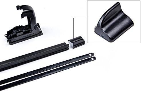Various components of a wiper blade laid out, including the main blade, end caps, and internal metal strips.