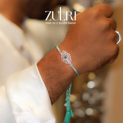 Image of 92.5 Sterling Silver Peacock Feather with Stone Thread Rakhi For Rakshabandhan | Rakhi With Fragrance Greeting Card & Roli Chawal and Silver Certificate of Authenticity