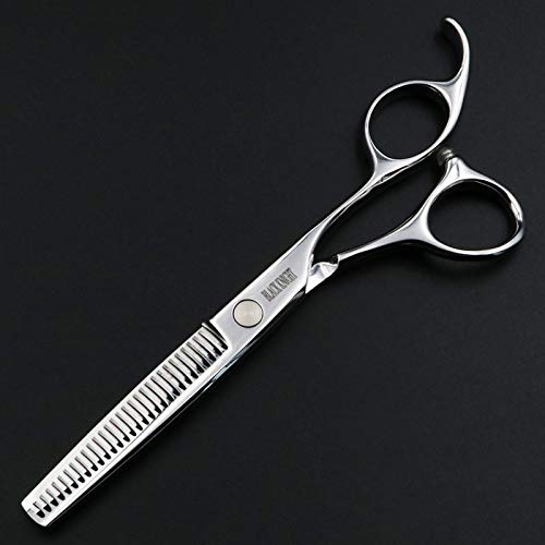 Un Ragazzo In Un Barbiere Per Bambini. Taglio Di Capelli Di Un Bambino In Un Moderno Parrucchiere Per Bambini Foto Stock - Foto 3