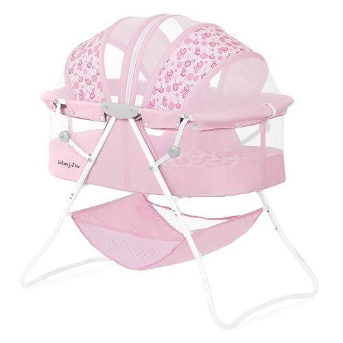 Image of Dream On Me Karley Bassinet in Pink, Lightweight Portable Baby Bassinet, Quick Fold and Easy to Carry, Adjustable Double Canopy, Indoor and Outdoor Bassinet with Large Storage Basket.